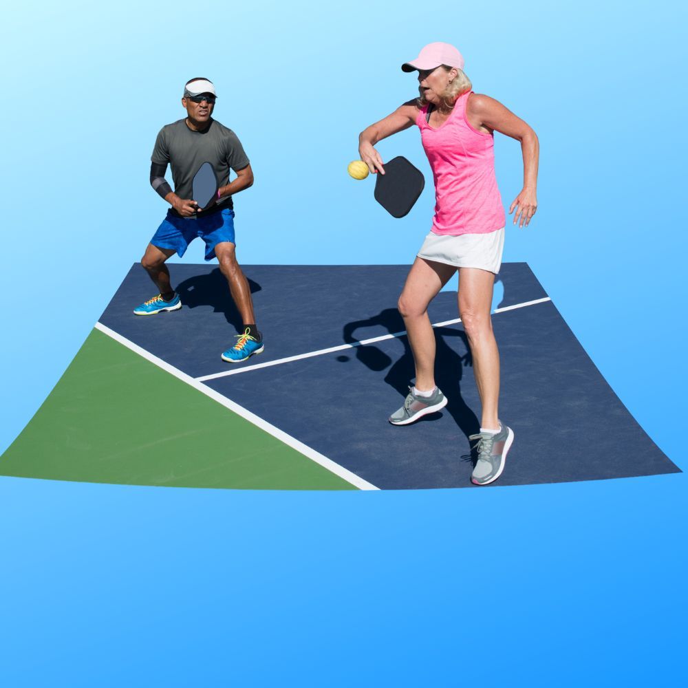 Two people playing pickleball in a pickleball tournament